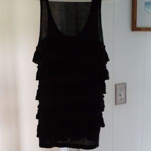 Sleeveless  shirt with  front  ruffles